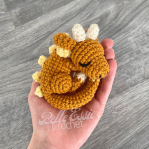 pluto the curled up sleeping dragon